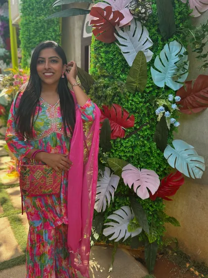 Dressed in vibrant colours for a festive Mehendi event in Bangalore. My look is always coordinated with the theme of the celebration, adding to the visual appeal of your special day.