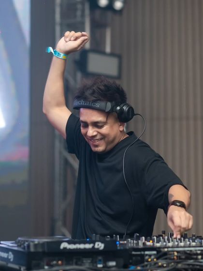 "Believe." A simple, powerful message captured in a moment of pure joy behind the decks.