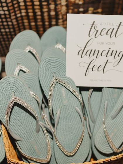 It is the small, thoughtful touches that make a difference. We placed baskets of flip-flops by the dance floor, a little treat for dancing feet that kept the party going all night long.