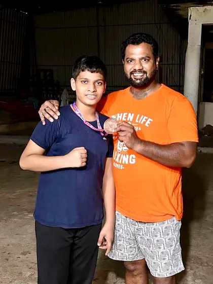 State bronze medalist Zaid Usman with his coach, showing the result of focused training.