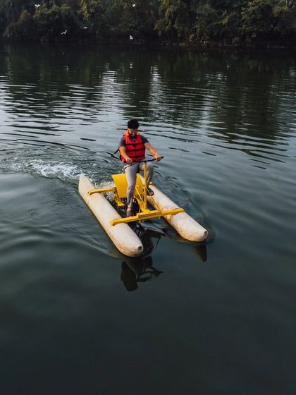 A solo adventurer enjoys a ride on the water cycle, a fun and unique activity on our lake.