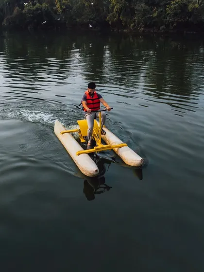 A solo adventurer enjoys a ride on the water cycle, a fun and unique activity on our lake.