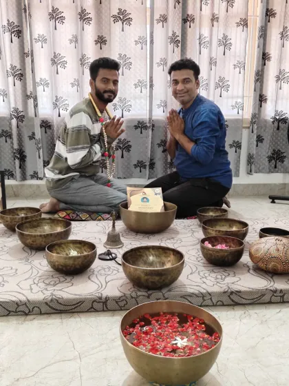 A moment of gratitude and respect between a student and me after the completion of the sound healing course.