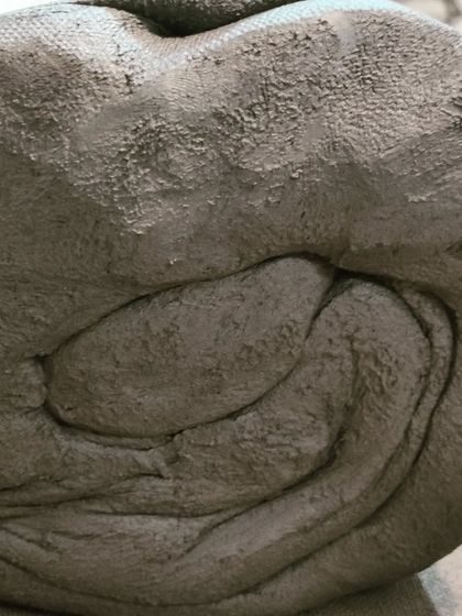 A large roll of prepared stoneware clay, ready to be portioned out for various projects. Seeing the raw material like this always fills me with a sense of possibility.