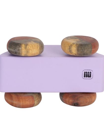 The bottom view of a purple wooden toy car with the brand mark.