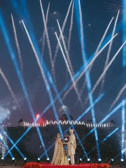A wide view of the Varmala stage, showcasing the synchronized fireworks and lighting design. I manage the technical production to ensure every element comes together in perfect harmony.