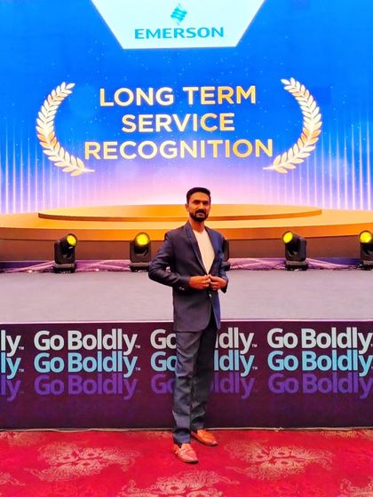 On the beautifully designed stage for the Emerson service recognition awards.