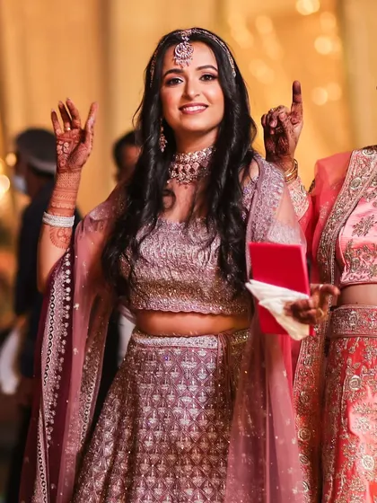 You glow differently when you're happy. This candid shot captures my client Sakshi enjoying her sister's wedding, looking radiant in her party makeup.