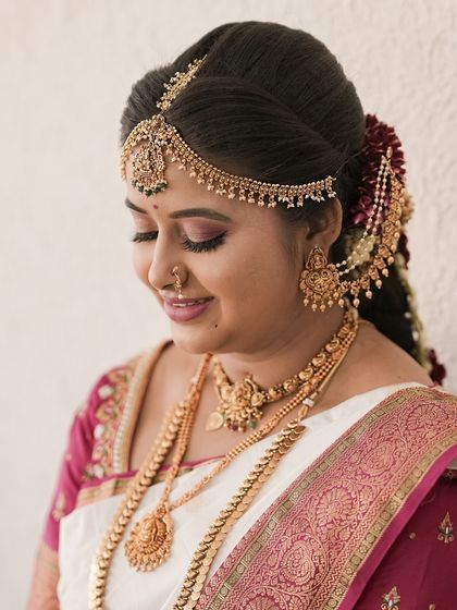A soft and serene portrait. The makeup enhances her features while maintaining a natural and elegant feel.