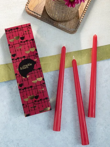 The same beautiful tapered candles, this time in a festive bright red. You can mix and match colors to create your own perfect holiday dining table setting.