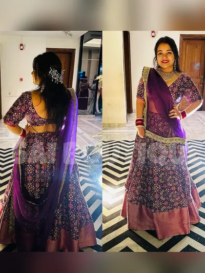 A beautiful custom-made purple lehenga with a unique back design. The patola print skirt paired with a solid blouse creates a balanced and elegant look for any wedding function.