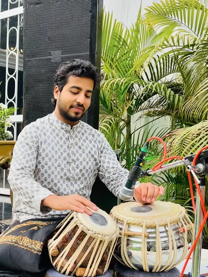 Deep in concentration during the outdoor performance.
