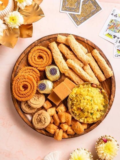 Hosting made easy this Diwali! Build your perfect platter with my snacks like chakli, almond fingers, and chivda. They are crunchy, wholesome, and loved by everyone.