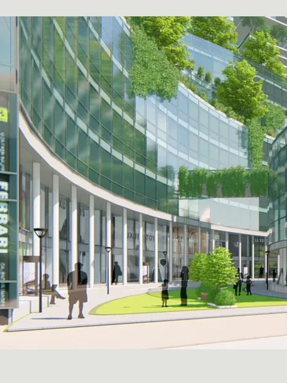The ground level of the Navjivan CHS proposal is designed to be a vibrant public realm. The curved glass facade, green lawns, and pedestrian-friendly walkways create an inviting commercial and social space that connects the development with the surrounding city.