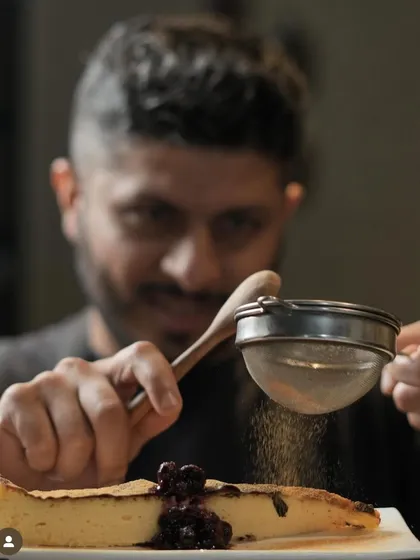 Basque-ing in the glory. Here I am adding the final touches to a slice of my burnt Basque cheesecake.