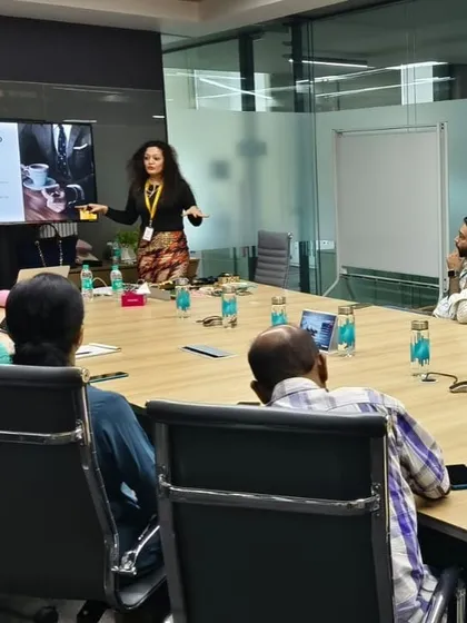 Presenting on the topic of transformation during a corporate workshop. I guide teams to understand that a change in image is not just about appearance, but about aligning their external presence with their internal goals.