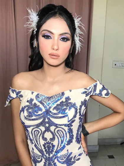 The complete look, a perfect example of creative and modern party makeup.