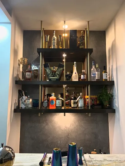 This is a permanent home bar installation I helped stock and organize. I can also provide my mobile bartending services to make your house parties feel like a professional bar experience.