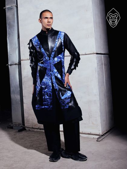 The full silhouette of the Electric Noir kurta. This look is a bold interplay of structure and fluidity, where digital-age drama meets couture craftsmanship.
