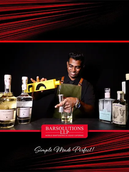 Our mixologist pouring with precision at the Outhouse Jewellery Fashion Show, where we served premium labels like Smoke Lab Vodka and El Cristiano Tequila.