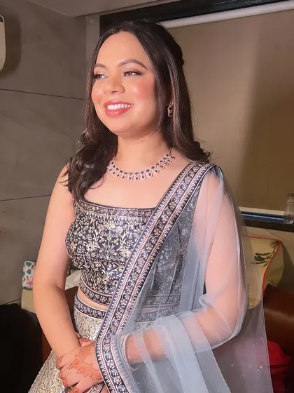 A princess-like look for this engagement bride. The makeup is soft and dreamy, with a focus on her radiant smile.