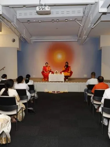 A view from the audience during our Siddha Healing and Meditation program in Sydney. The setup is designed to focus all attention on the spiritual guidance being shared.