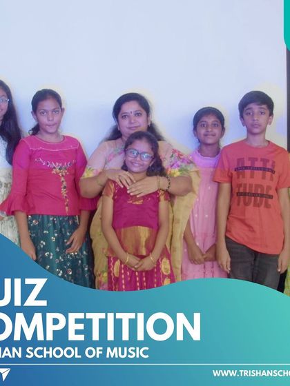 A group of our junior quiz participants with their teacher. We foster a spirit of friendly competition and collaborative learning.