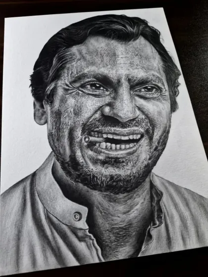 This realistic portrait of actor Nawazuddin Siddiqui was a personal project. I spent hours on the details, from the texture of his skin to the intensity in his eyes, to create a powerful and lifelike charcoal drawing.
