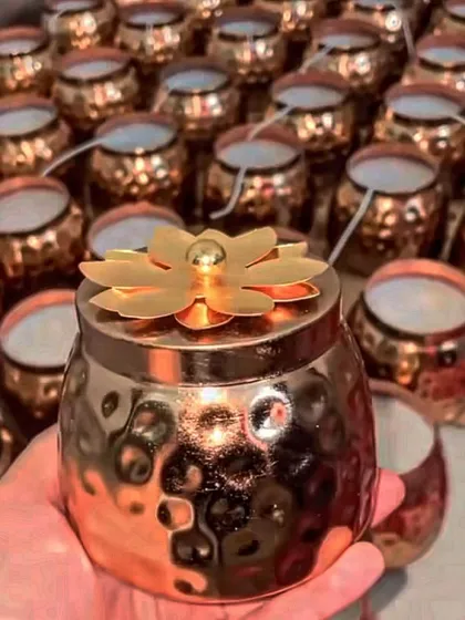 Our metal matki candles are back in stock. This beautiful piece combines a metallic finish with a floral lid, making it a stunning decorative item and a wonderful gift.