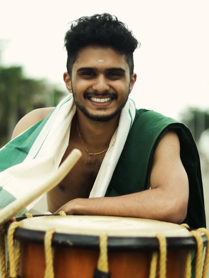 A warm smile from one of our drummers. We are serious about our music, but we are also approachable and love what we do.