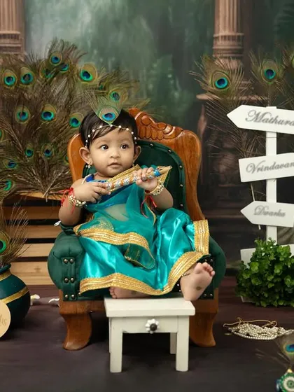 A serene portrait of a baby dressed as Krishna, sitting peacefully on a miniature throne.