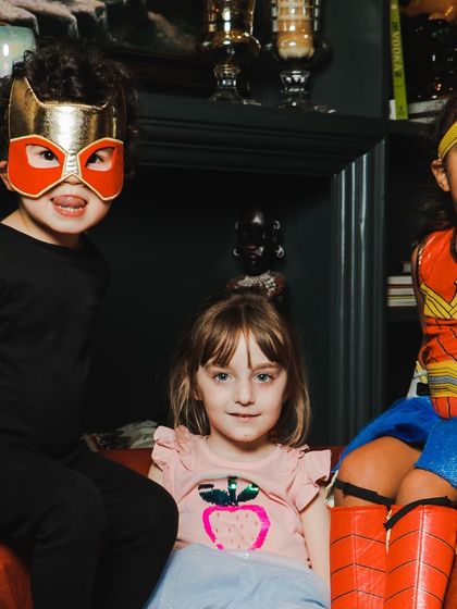 Three little superheroes taking a break. Our classes and parties are filled with moments of dance, play, and friendship.