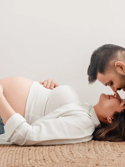 Your own clothes, your own story. A maternity session doesn't always require a gown; sometimes the most beautiful portraits come from simple, relaxed moments in a favorite pair of jeans.