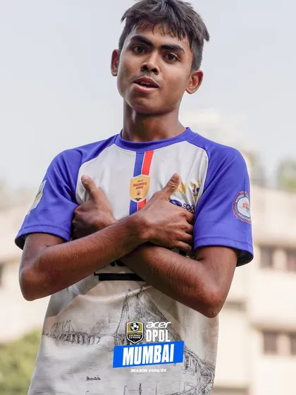 A player shows his pride for the badge. We instill a sense of belonging and commitment in all our athletes.