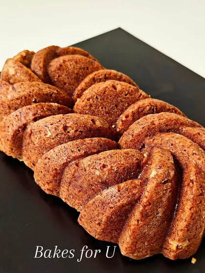 This is a whole wheat loaf-style Bundt cake. Its beautiful braided design stands on its own, showcasing the simple, rustic elegance of my wholesome bakes.