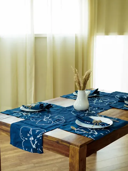 A collection of our product photography for various home decor and tableware brands. These shots display a range of items including placemats, table runners, ceramic bowls, plates, vases, bar tools, and candles, all styled to perfection.