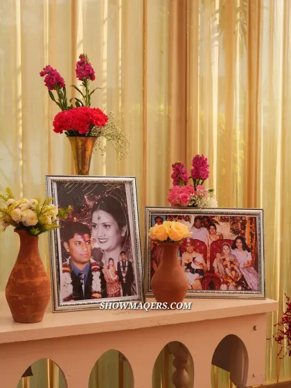 A collection of family photos adds a warm, personal, and nostalgic touch to the celebration.