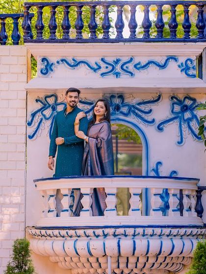 A wide shot of the Santorini-inspired balcony, a perfect spot for a romantic and picturesque photo.