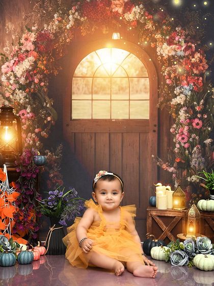 Sitting pretty in an enchanted garden. This theme uses a beautiful floral arch and warm lighting to create a fairytale-like setting.