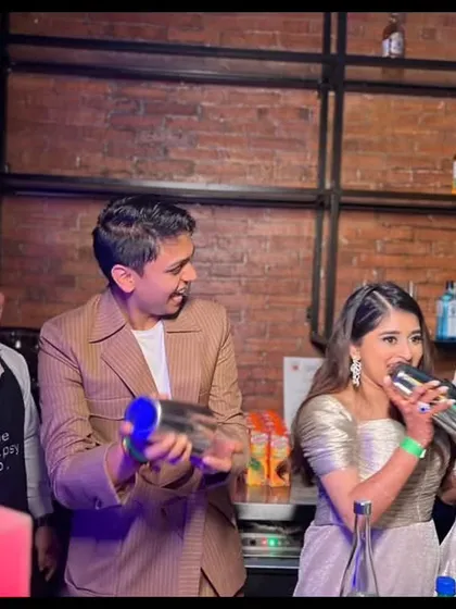 The bride and groom join in the fun, shaking up their own cocktails with guidance from our team. It's a fantastic way to add a personal and interactive element to their celebration.