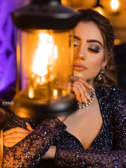 A moody and artistic shot of a model wearing our heavy polki-diamond choker, perfect for an engagement or cocktail night.