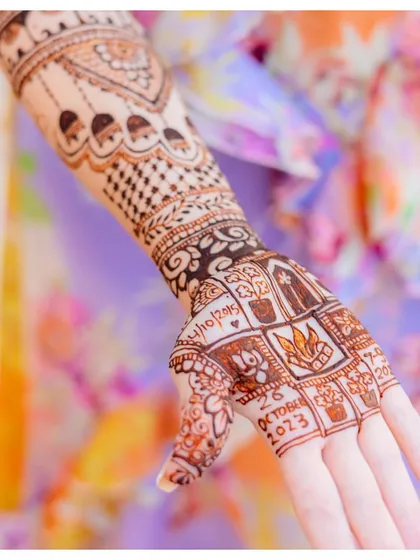 More than just patterns, this bride's henna tells a story, with dates and symbols that are meaningful to the couple's journey.