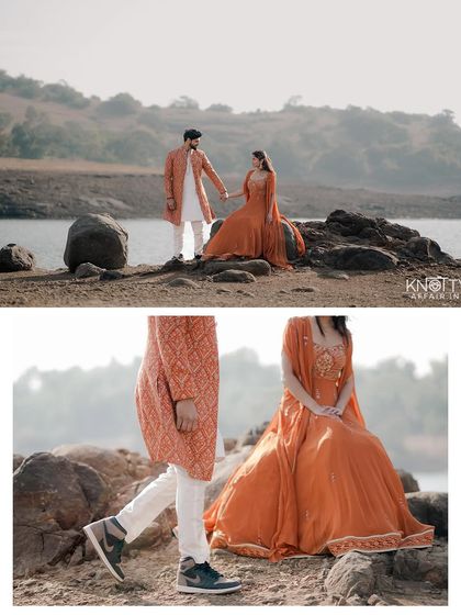 Details matter. This composition highlights both the couple's elegant attire and their connection to the stunning lakeside scenery, creating a balanced and artistic pre-wedding photograph.