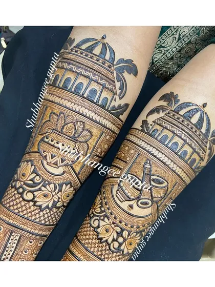 A bridal arm band design featuring palace architecture and other wedding symbols. This is a great option for brides who want a story on their arms.