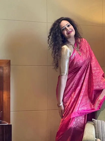 Embracing traditional wear with a modern sensibility. A well-draped saree can be one of the most elegant and powerful statements in a woman's wardrobe, perfect for special occasions.