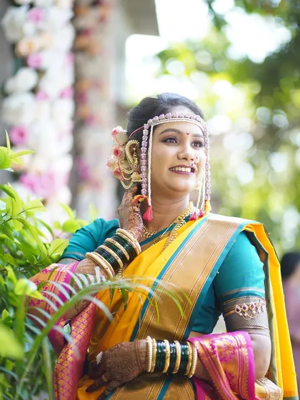 A joyful, candid shot of the bride. Her makeup is designed to look great from all angles and in all lighting conditions.