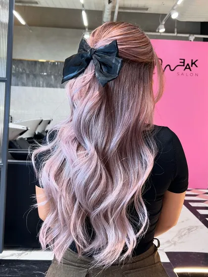 Another view of the stunning Platinum Lily hair. The icy, luminous blend of silver and white creates a sleek, modern, and almost ethereal vibe.