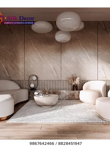 This living space showcases our expertise in creating ultra-modern and sculptural furniture. The curved white sofa and matching armchairs are custom-designed to create a soft, inviting, and sophisticated seating area. This is an example of how we can tailor unique silhouettes to fit a specific design vision.