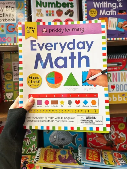 Making math accessible and fun is easy with our "Everyday Math" workbook. Designed for ages 5 to 7, it introduces concepts like shapes and fractions through colorful, practical exercises.