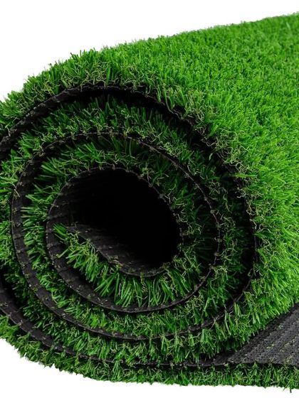 A close-up of a 20mm artificial grass roll. This shorter pile height is excellent for commercial spaces, events, or areas that need to be very easy to clean.